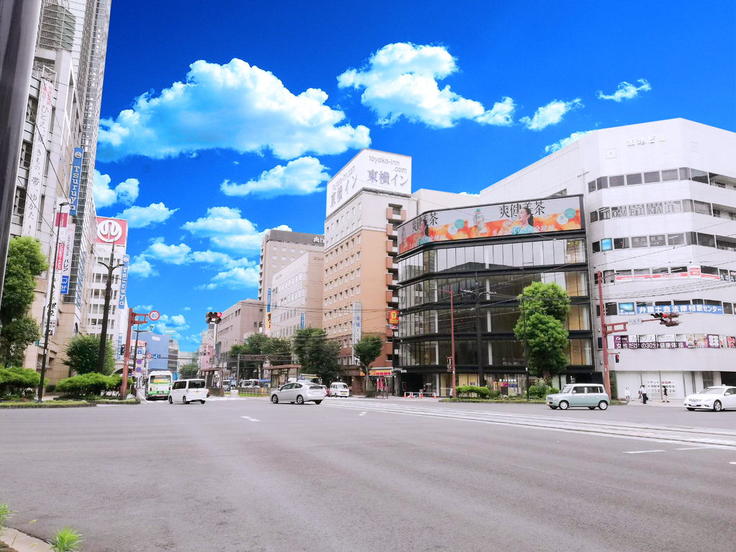 青空の下に広がる水道町交差点の街並み